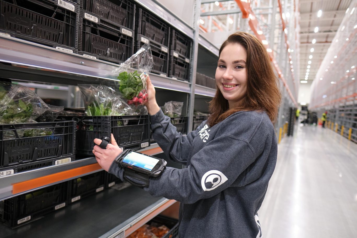 Working as an order picker in Dutch e-commerce centre. Order picking in Jumbo warehouse.